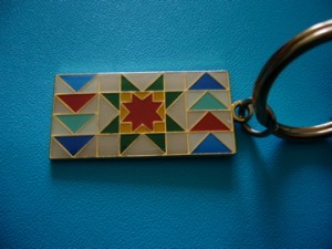Quilting travel bug Quilting travel bug on cool geocoins